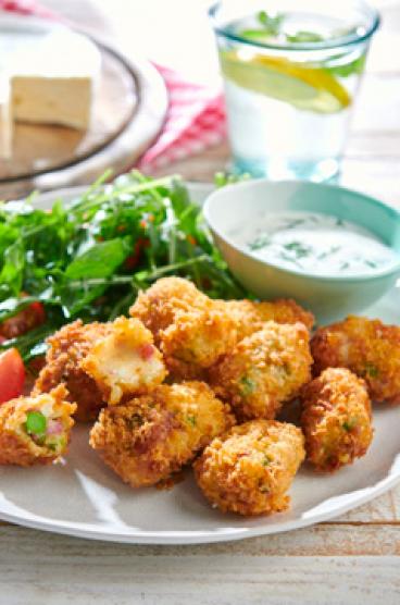 Breaded camembert croquettes with Le Rustique Camembert Mint, salami and garlic yoghurt