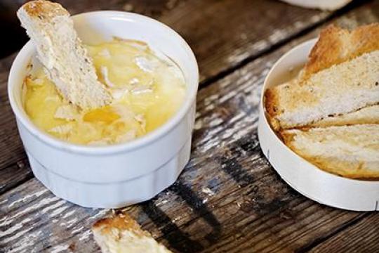 Baked eggs with andouille de vire and Le Rustique camembert